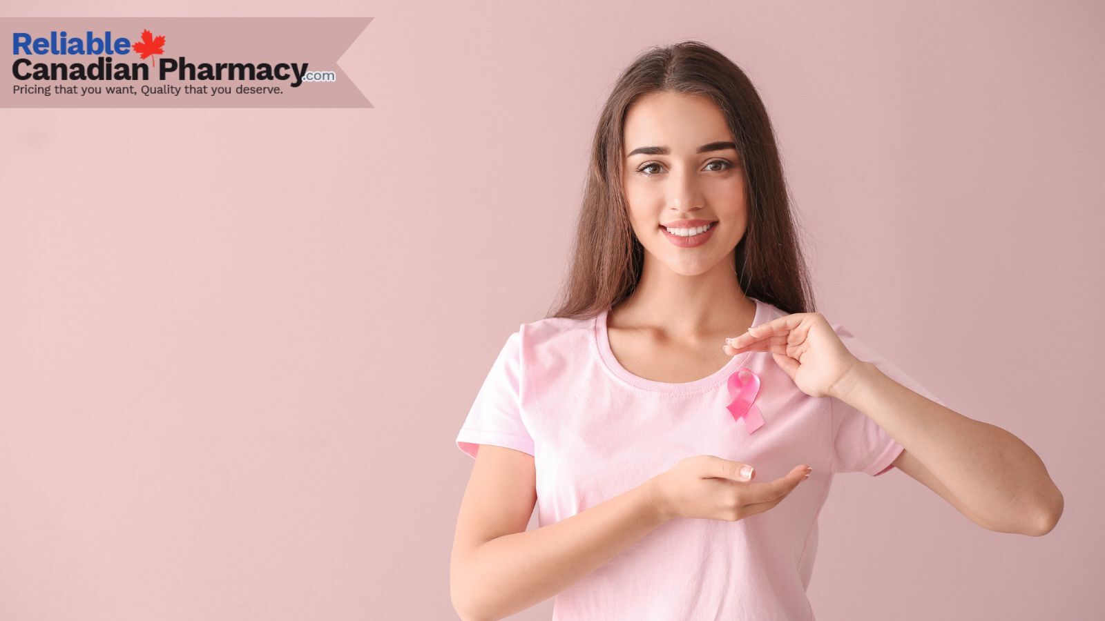 A woman holding pink ribbon to create breast cancer awareness.