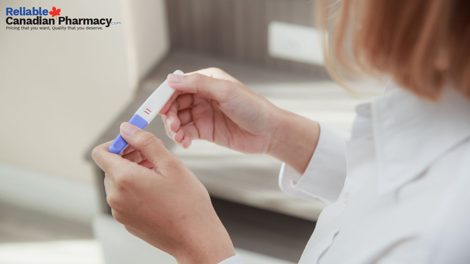 A woman checking pregnancy kit to determine the pregnancy results.